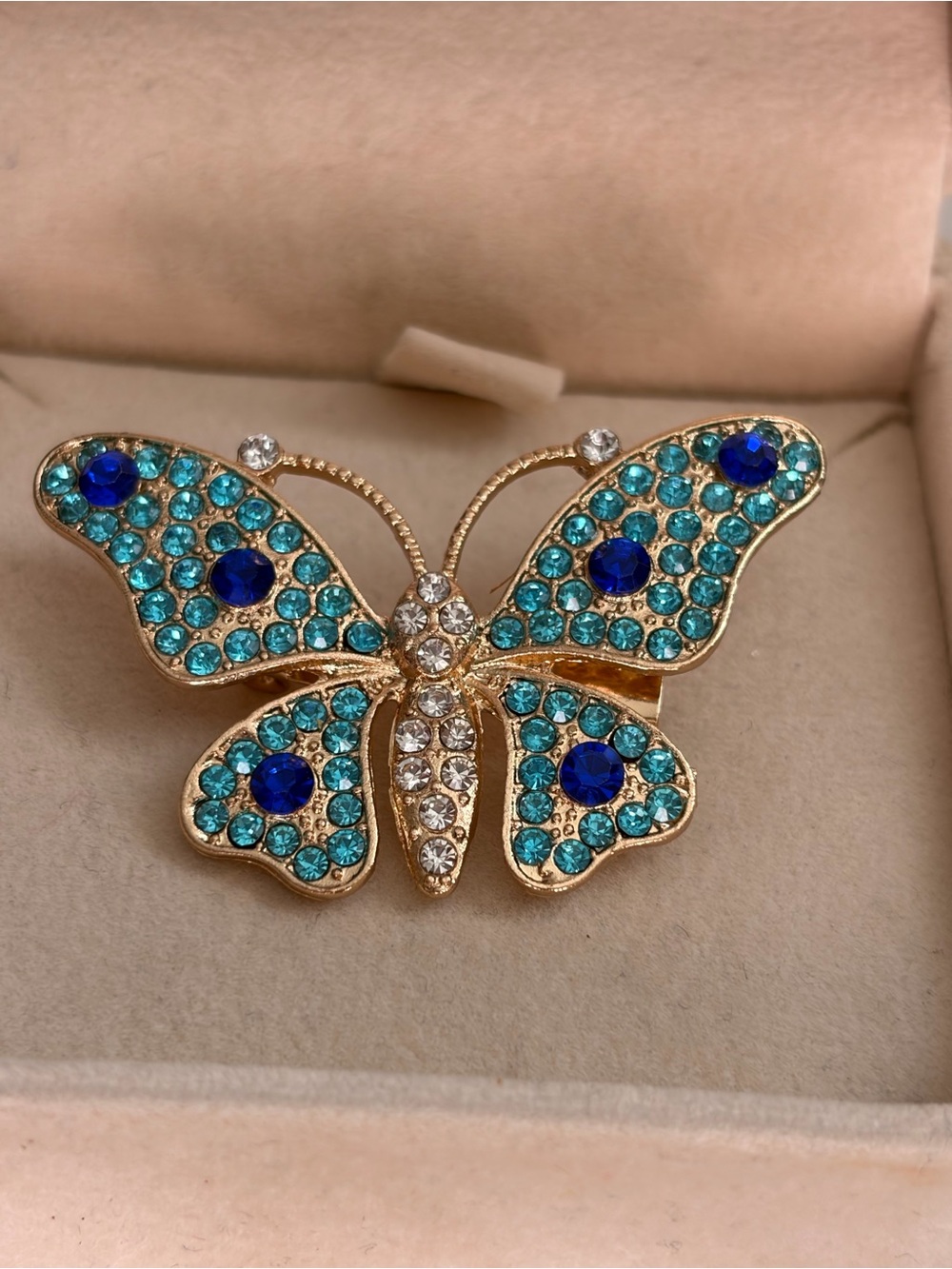 4/$100 Gold Butterfly Brooch with Teal and Royal Blue Crystals